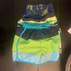 Three boys swimsuits size 3T.